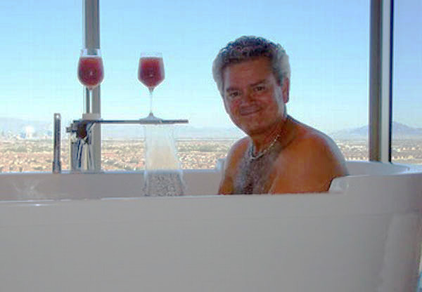 Jeffrey Neely, 59, was infamously pictured in a hot tub during a government-funded junket in Las Vegas that cost taxpayers $823,000.Â (Photo courtesy: NY Post)