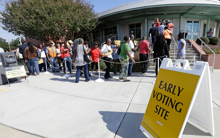 The NAACP alleges that at least three North Carolina counties have violated federal procedures and purged voter rolls based on undeliverable mail. (AP Photo0