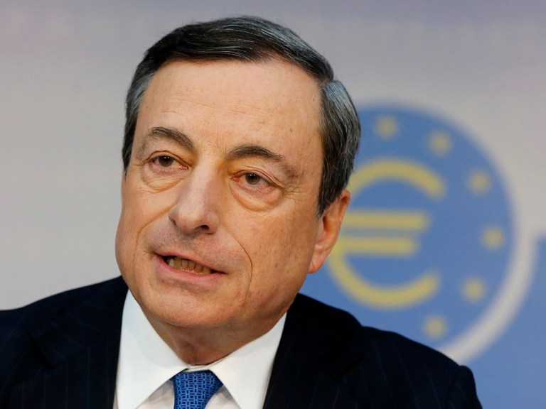 President of European Central Bank Mario Draghi speaks during a news conference in Frankfurt, Germany, Thursday,  June 5, 2014, following a meeting of the ECB governing council. The ECB lowered its main interest rate to 0.15 per cent. (AP Photo/Michael Probst)