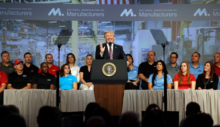 The Coalition for Regulatory Innovation was created by the National Association of Manufacturers and other trade groups. (AP Photo/Evan Vucci)