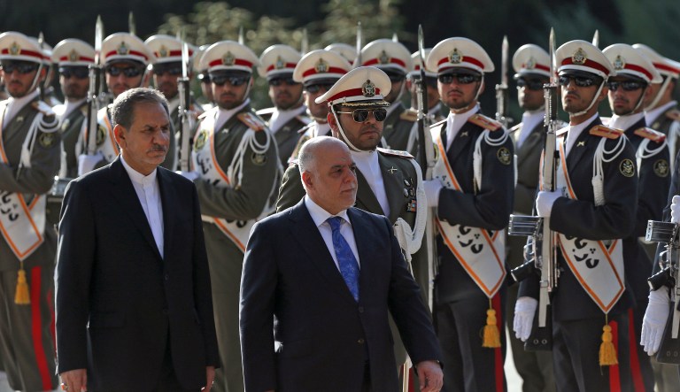 Eight lawmakers are urging Iraqi Prime Minister Haider al-Abadi to strike an agreement that would end a crisis between the central government and the Kurds. (AP Photo/Vahid Salemi)