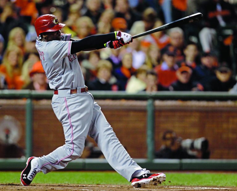Eric Risberg/AP
Brandon Phillips had three hits and three RBIs, including a two-run home run in the third inning, as the Reds beat the Giants on Saturday.