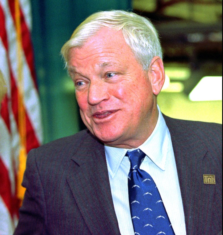FILE - In a Oct. 23, 1997 file photo, Richard Mellon Scaife, owner and publisher of the Tribune Review newspapers in Pittsburgh and Greensburg, Pa., greets visitors as they enter the paper's new facility in Warrendale, Pa., during the dedication of the building. Scaife said in a column published Sunday, May 18, 2014, that he has an untreatable form of cancer. The 81-year-old Scaife is an heir to the Mellon banking fortune and is a notable backer of conservative causes. He serves as the vice chairman of the board of the Heritage Foundation. (AP Photo/Keith Srakocic, File)
