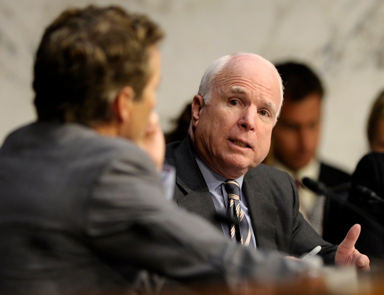   Senate Foreign Relations Committee members Sen. John McCain, R-Ariz, right, and Sen. Rand Paul, R-Ky., talk on Capitol Hill in Washington, Wednesday, Sept. 4, 2013, during the committee's hearing to consider the authorization for use of military force in Syria . (AP Photo/Susan Walsh)  
