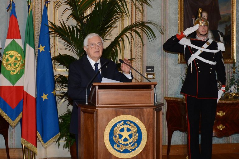   In this photo released by the Italian Presidency, the general secretary Donato Marra officially announces the resignation of Mario Monti at the Quirinale presidential palace in Rome Friday, Dec. 21, 2012. Mario Monti handed in his resignation to Italy's president in Rome on Friday, bringing to a close his 13-month technical government and preparing the country for national elections. President Giorgio Napolitano -- who tapped Monti in November 2011 to come up with reforms to shield Italy from the continent's debt crisis -- asked Monti to stay on as head of a caretaker government until the national vote, expected in February. (AP Photo/Antonio Di Gennaro, Italian Presidency ho)  