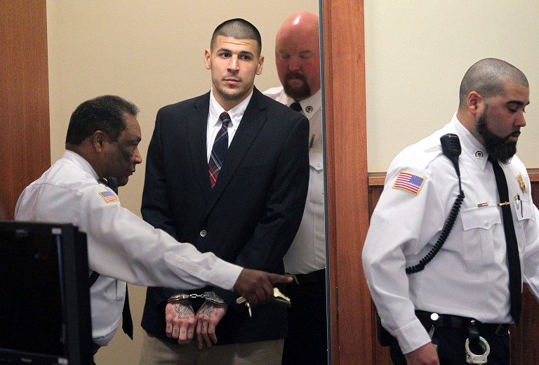 Massachusetts prison officials said former New England Patriots NFL football player Aaron Hernandez hanged himself in his cell and was pronounced dead at a hospital early Wednesday. (Matt Stone/The Boston Herald via AP, Pool, File)