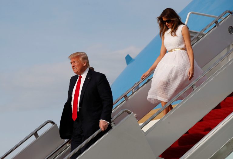 Does President Trump leave too much space between himself and first lady Melania Trump when descending the steps of Air Force One? (AP Photo/Alex Brandon)
