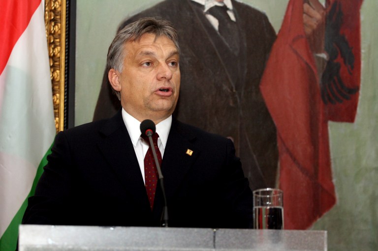 FILE - This is a Wednesday, Nov. 28, 2012 file photo of Hungarian Prime Minister Victor Orban as he speaks at a news conference in Tirana where he went to celebrate Albania's 100th anniversary of independence.  A Hungarian  opposition group said Tuesday July 29, 2014 it would ask the European Union to step up its oversight of democracy in Hungary after the Prime Minster Vicktor Orban said he wants to transform the country from a liberal democracy into an 