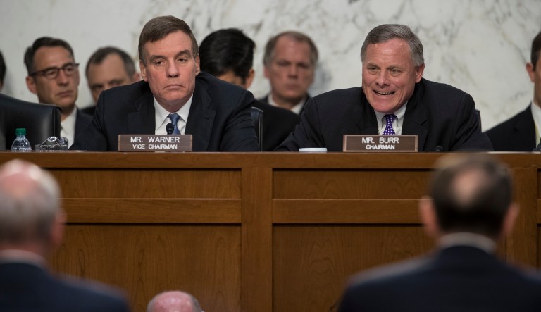 Senate Intelligence Committee Chairman Richard Burr, R-N.C., right, joined by Vice Chairman Mark Warner, D-Va., left, questions top national security chiefs about gathering intelligence on foreign agents. Republican and Democratic senators were left frustrated and fuming after the intelligence officials refused to shed any light on their communication with President Trump. (AP Photo/J. Scott Applewhite)