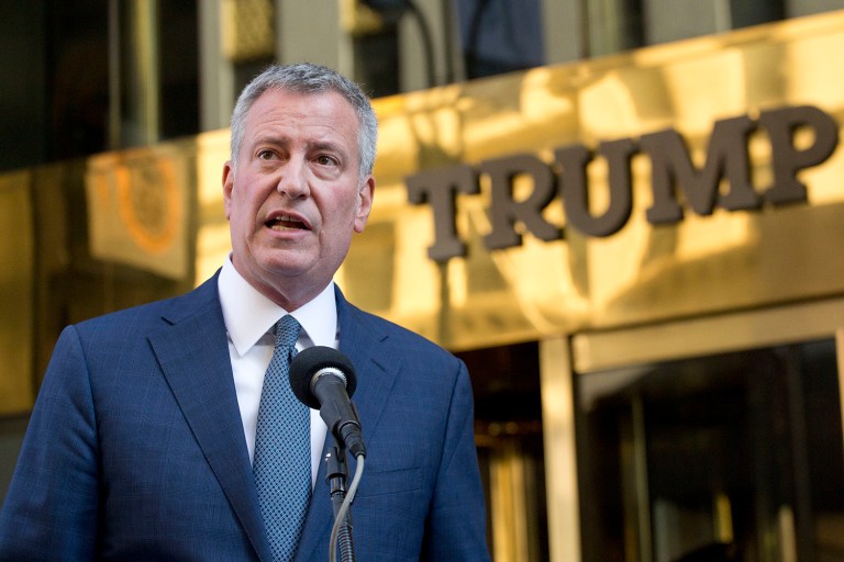 New York Mayor Bill de Blasio holds a news conference in front of Trump Tower following a meeting with President-elect Trump in New York. (AP Photo/Mark Lennihan)