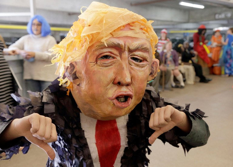 People had more respect for used car salesmen, traffic jams, hipsters, the DMV, root canals, jury duty and Nickelback than Trump. (AP Photo/Nick Ut)