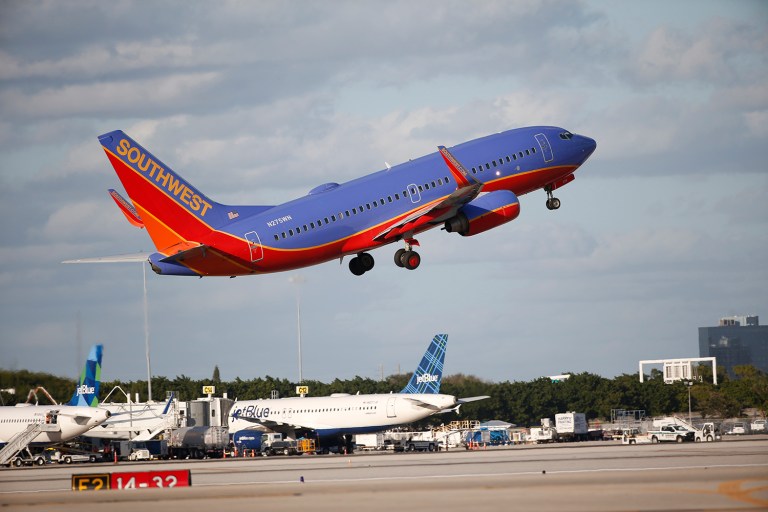 Although the co-pilot was arrested, the flight to Chicago was delayed four hours. (AP Photo/Wilfredo Lee)