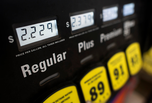 The price of fuel is seen on a pump at a Sunoco Inc. gas station in Rockbridge, Ohio, U.S., on Wednesday, Dec. 17, 2014. Retail gasoline prices have fallen about 24% this year, yet crude oil and wholesale gasoline price declines have been more profound, highlighting an inconsistent relationship. (Ty Wright/Bloomberg via Getty images)