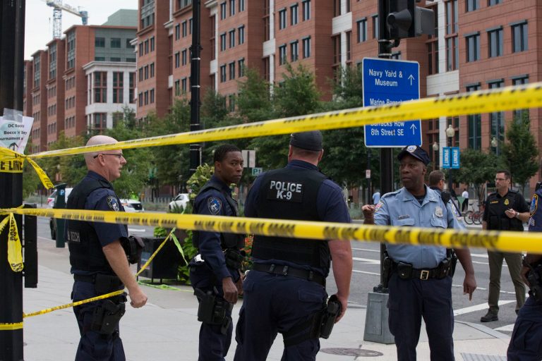 Police work the scene on M Street, SE in Washington near the Washington Navy Yard on Monday, Sept. 16. (AP/Jacquelyn Martin)