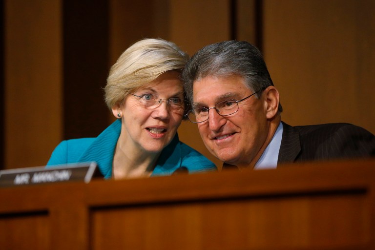 Uncompromising resistance by Democrats yields mixed results for Sens. Elizabeth Warren and Joe Manchin. (AP Photo/Charles Dharapak)