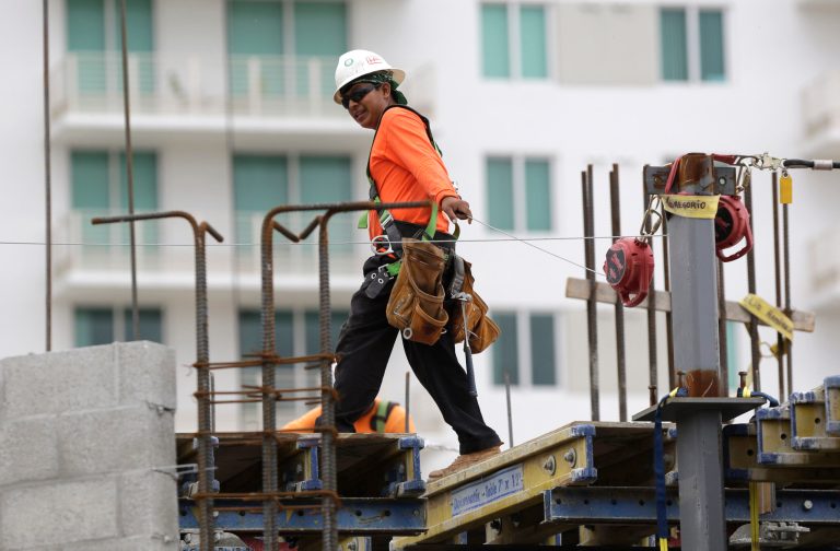 In this Friday, May 16, 2014 photo, a construction worker works on the site of the SoMa at Brickell apartment building in downtown Miami. The Institute for Supply Management, a trade group of purchasing managers, issues its index of non-manufacturing activity for May on Wednesday, June 4, 2014. (AP Photo/Lynne Sladky, File)