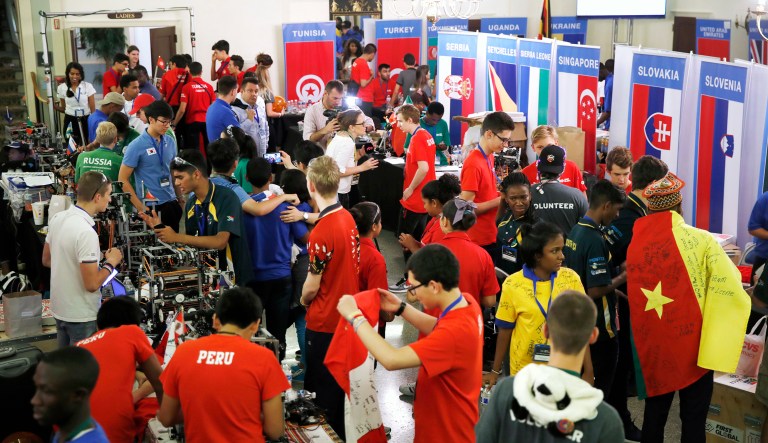 Students from across the world meet during the FIRST Global robotics challenge in Washington. (AP Photo/Jacquelyn Martin)
