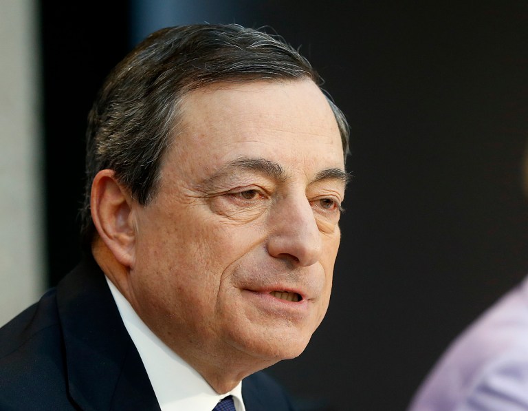 President of the European Central Bank, ECB, Mario Draghi speaks during a news conference in Frankfurt, Germany, Thursday,  April 3, 2014, following a meeting of the ECB governing council. The ECB decided to leave its main interest rate unchanged. (AP Photo/Michael Probst)