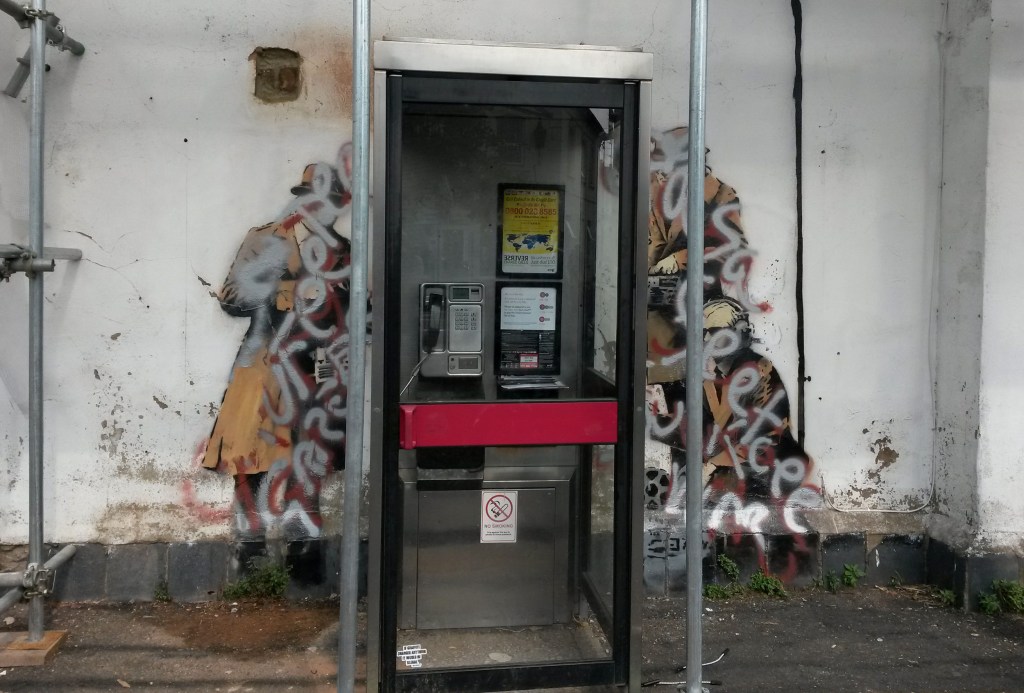 Banksy’s ‘Spy Booth’ artwork defaced