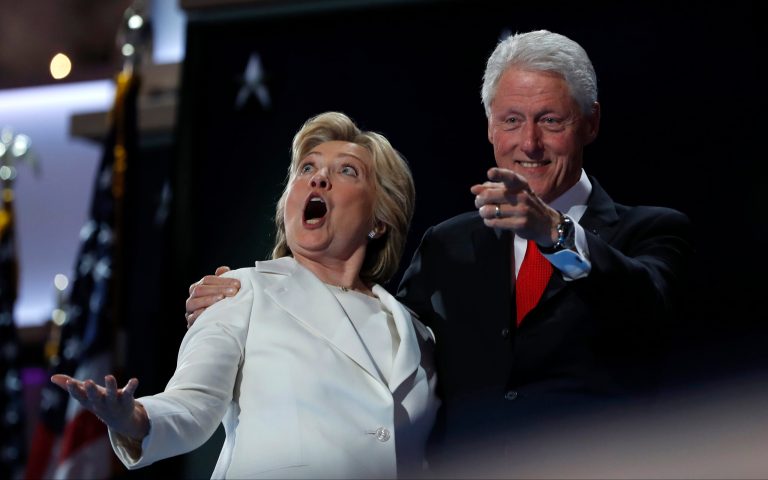 Democratic presidential nominee Hillary Clinton and Former President Bill Clinton react as balloons fall during the final day of the Democratic National Convention in Philadelphia, Thursday, July 28, 2016. (AP Photo/Carolyn Kaster)
