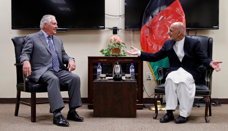 Secretary of State Rex Tillerson speaks with Afghan President Ashraf Ghani before their meeting at Bagram Air Field, Afghanistan. The State Department said Tillerson's unannounced visit was to outline for them the Trump administration's new South Asia policy. (AP Photo/Alex Brandon, Pool)