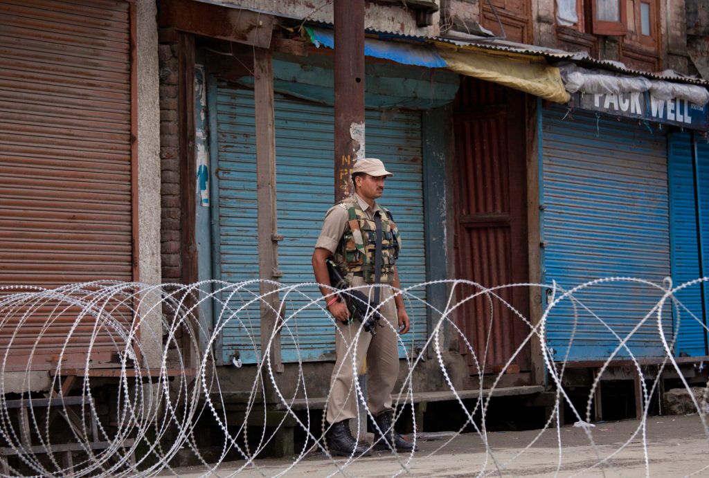 Strike, curfew shut Kashmir as India leader visits