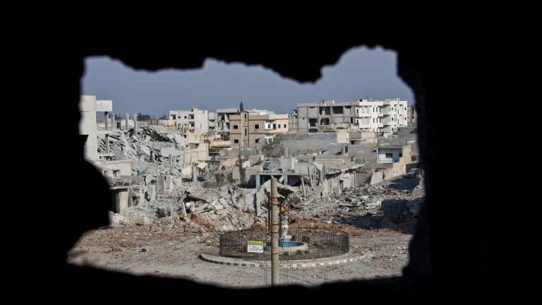 An area controlled by the Islamic State group in Kobani, Syria. Kurdish fighters backed by intense U.S.-led airstrikes pushed the Islamic State group almost entirely out of the Syrian town of Kobani on Monday, Jan. 26, 2015, marking a major loss for extremists whose hopes for easy victory dissolved into a bloody, costly siege that seems close to ending in defeat. (AP Photo/Jake Simkin)