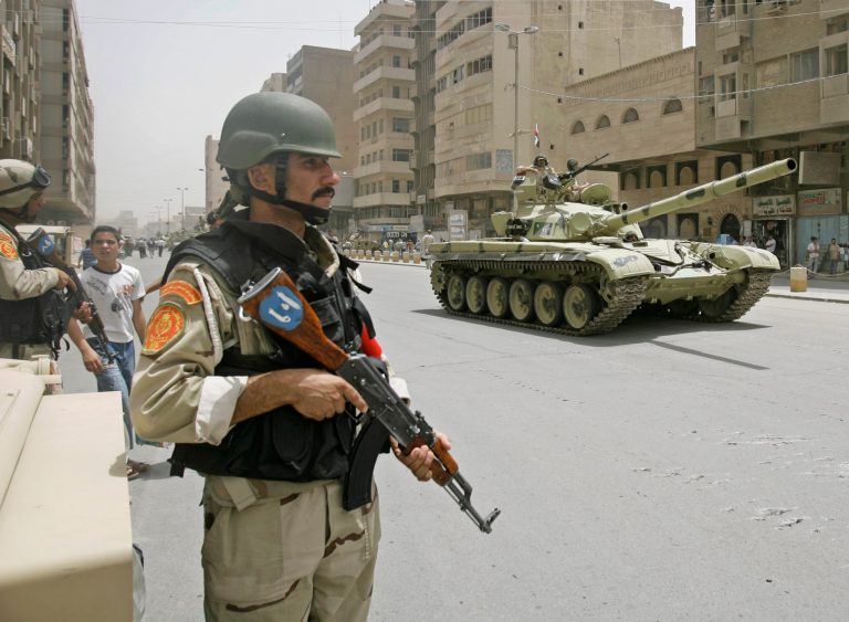 Iraqi Army patrol in central Baghdad, Iraq, in this Tuesday, June 30, 2009 file photo. (AP Photo/Khalid Mohammed)