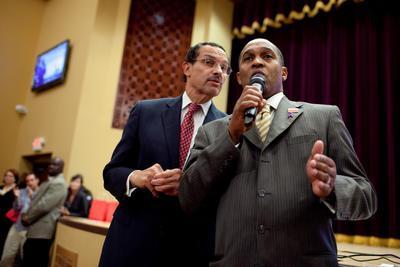 Then-mayoral apparent Vincent Gray holds his first of a series of town hall meetings with Ward 5 Councilman Harry Thomas Jr. at the Community Academy Public Charter School in Northwest Washington on Oct. 5, 2010.