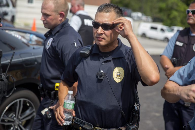 A police officer wears a body camera at a rally for Michael Brown on Aug. 30 in Ferguson, Mo. (Aaron P. Bernstein/Getty images)