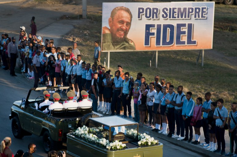 The motorcade carrying the ashes of the late Cuban leader Fidel Castro makes i's final journey towards the Santa Ifigenia cemetery in Santiago, Cuba Sunday, Dec. 4, 2016. (AP Photo/Ramon Espinosa)