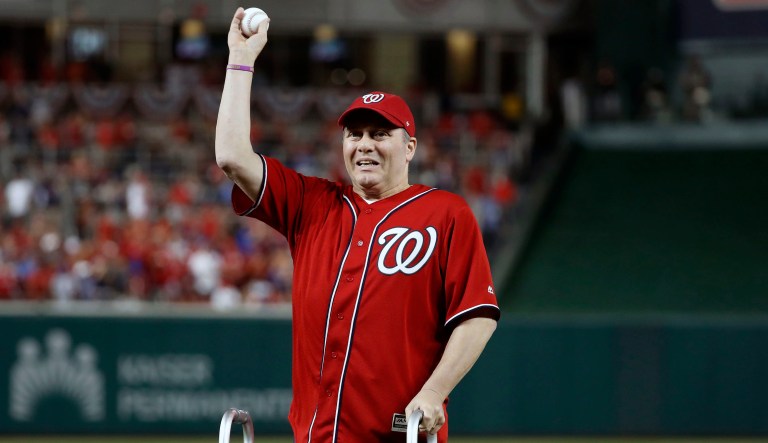 House Majority Whip Steve Scalise, R-La., who was shot while practicing for the Congressional Baseball Game in June, threw the first pitch before the playoff game between the Washington Nationals and Chicago Cubs at Nationals Park Friday night. (AP Photo/Alex Brandon)