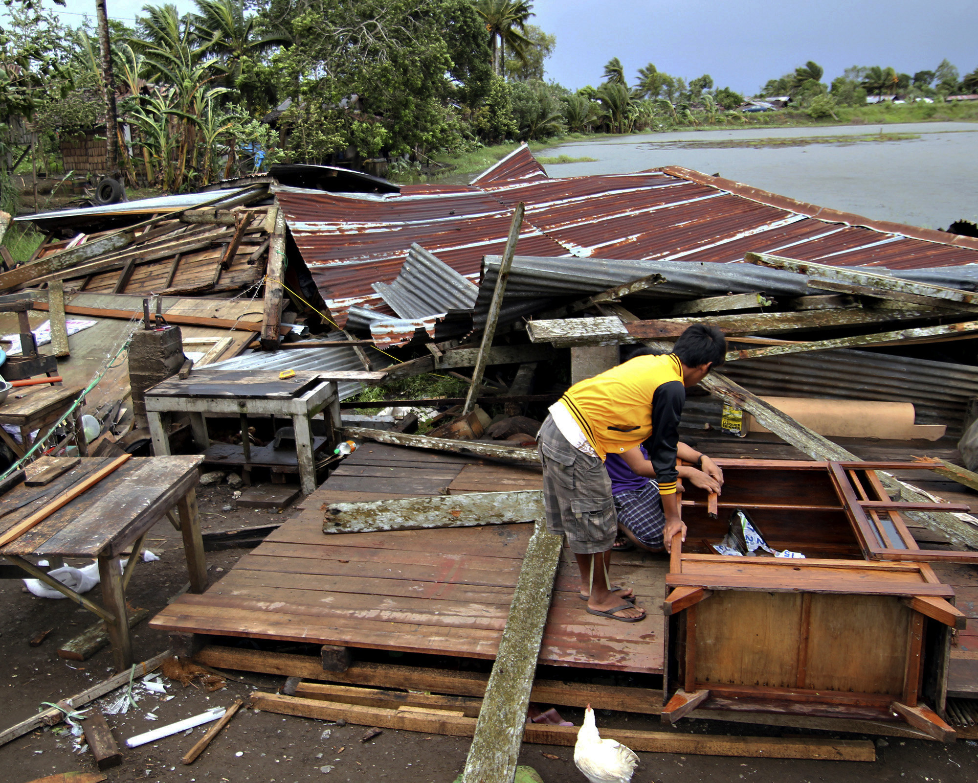 Powerful typhoon kills at least 74 in Philippines
