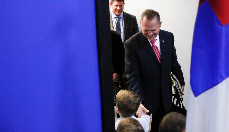 Moore seems to have largely retained the support of President Trump's ardent base, with which Hannity and Bannon carry serious leverage. (AP Photo/Brynn Anderson)