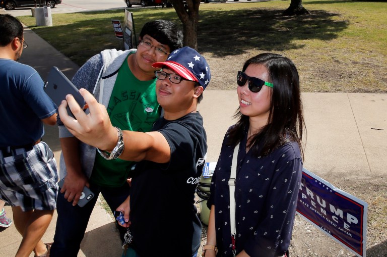 How have Clinton and Trump failed to capture the enthusiasm of the youth vote? (AP Photo/Tony Gutierrez)
