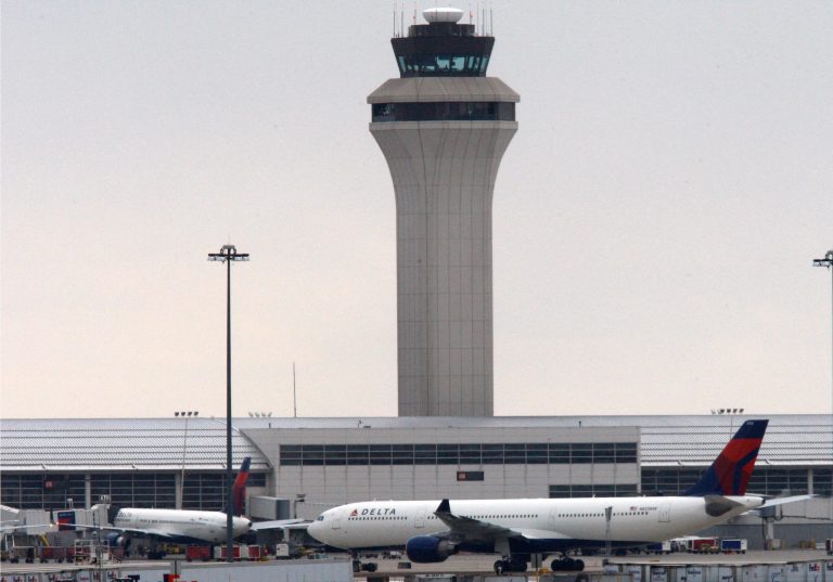 FILE - This Dec. 26, 2009, file photo shows jets outside Detroit Metropolitan airport in Romulus, Mich. Hussain Al Kwawahir, arrested Saturday at the airport after lying about why he was traveling with a pressure cooker, is set to be arraigned Monday, May 13, 2013, in federal court in Detroit. The Saudi man is accused of using a passport with missing pages and lying to Customs and Border Protection agents. (AP Photo/Carlos Osorio, File)