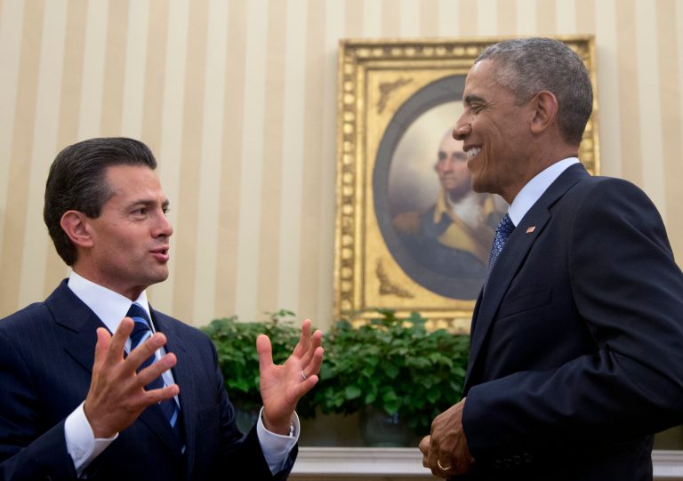 President Barack Obama hosts a bilateral meeting with Mexican President Enrique Pena Nieto, Tuesday, Jan. 6, 2015, in the Oval Office of the White House in Washington. The president is looking to his southern neighbor for help implementing the changing policies on immigration and Cuba. (AP Photo/Carolyn Kaster)