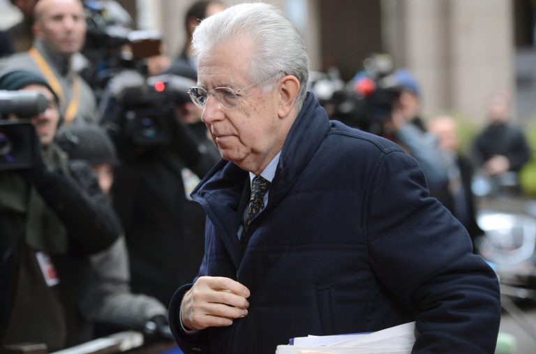   Italian Prime Minister Mario Monti arrives for an EU summit in Brussels on Friday, Dec. 14, 2012. France and Germany have had more than their share of difference over the past few months, but this week at long last the two countries were able to find a compromise that allowed the European Union to realize a deal on a banking union. (AP Photo/Geert Vanden Wijngaert)  