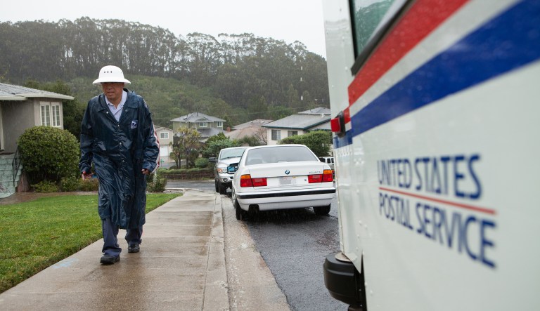 The U.S. Postal Service reported a $573 million increase in losses from a year earlier, driven by less mail being delivered as technology replaces the stamp and envelope. (AP Photo/Alex Washburn, File)