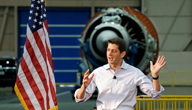 House Speaker Paul Ryan speaks to workers at the Boeing Co. and in view of a Rolls Royce Trent 1000 engine for a 787 jet, behind, in Everett, Wash. (AP Photo/Elaine Thompson)