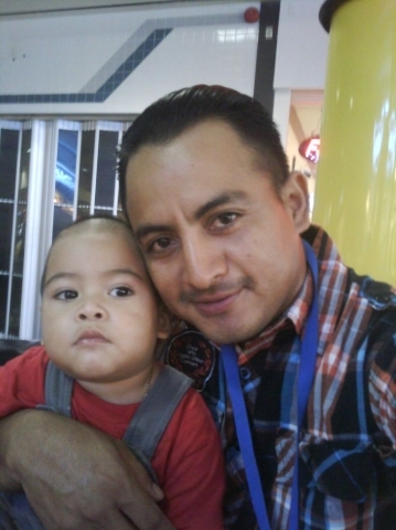 One-year-old Cesar Steven Martinez was allegedly abducted by his father Julio Cesar Arriaza (right).