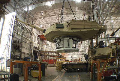 This undated file photo provided by the General Dynamics Land System shows the production of an Abrams tank in Lima, Ohio. (AP Photo/General Dynamics Land System, File)