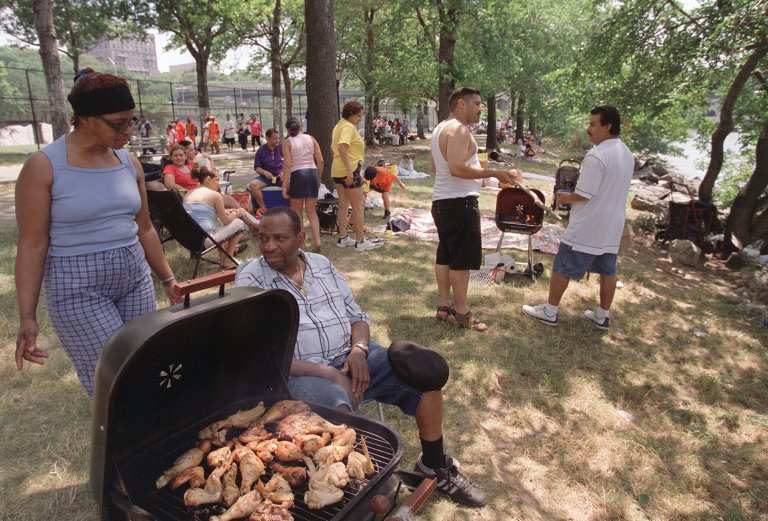 New Yorkers picnic along the Hudson River on Manhattan's Upper West Side. (AP Photo/ML)