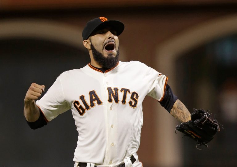 Marcio Jose Sanchez/AP
San Francisco Giants closer Sergio Romo reacts after the Giants defeated the Detroit Tigers 2-0 in Game 2 in the World Series on Thursday. 
