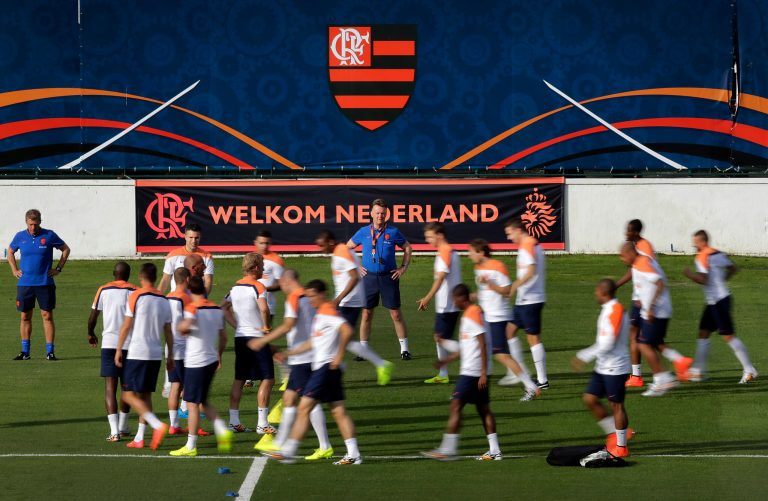 Louis van Gaal, coach of the Netherlands soccer team, center, watches his team during a training session in Rio de Janeiro, Brazil, Friday, June 6, 2014. The Netherlands plays in group B of the 2014 soccer World Cup. (AP Photo/Wong Maye-E)