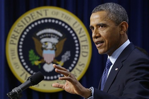 President Barack Obama gestures as he speaks about the fiscal cliff, Monday, Dec. 31, 2012, in the South Court Auditorium at the White House in Washington. The president said it appears that an agreement to avoid the fiscal cliff is 