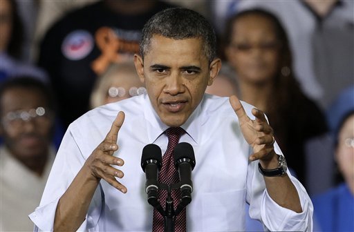 President Barack Obama gestures as he speaks to workers about the economy during a visit to Daimler Detroit Diesel in Redford, Mich., Monday, Dec. 10, 2012.  (AP Photo/Paul Sancya)