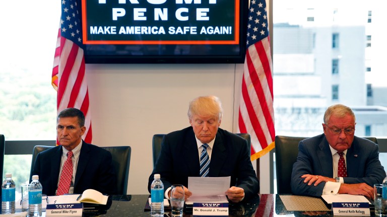 Retired Lt. Gen. Keith Kellogg, right, a senior adviser to candidate Trump, told reporters inside Trump Tower on Tuesday that he has no sense of timing regarding an announcement about the president-elect's national security team. (AP Photo/Gerald Herbert, File)