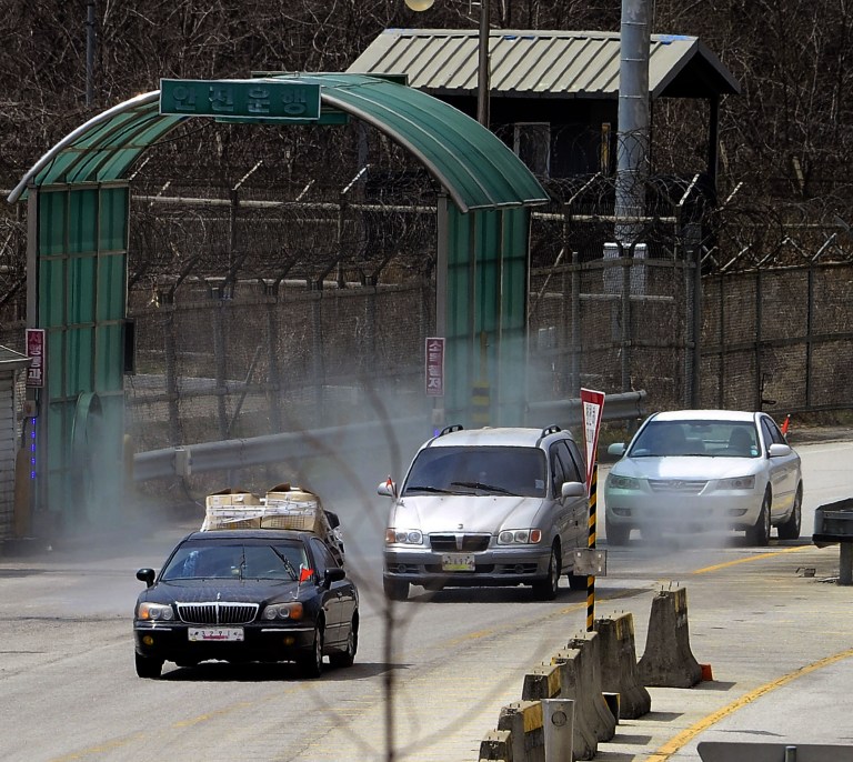 South Korean vehicles, returnning from the North Korean city of Kaesong, arrive at the customs, immigration and quarantine office near the border village of Panmunjom, in Paju, north of Seoul, South Korea, Tuesday, April 9, 2013. North Korean workers didn't show up for work at the Kaesong industrial complex, a jointly run factory with South Korea on Tuesday, a day after Pyongyang suspended operations at the last remaining major economic link between rivals locked in an increasingly hostile relationship. (AP Photo/Kyodo News) JAPAN OUT, MANDATORY CREDIT, NO LICENSING IN CHINA, HONG KONG, JAPAN, SOUTH KOREA AND FRANCE