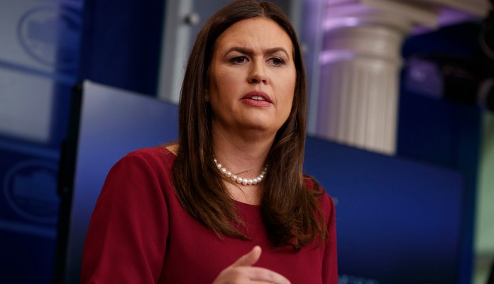 "We will see if Pyongyang's message today, that it is willing to hold talks, represents the first steps along the path to denuclearization,"
			Sarah Sanders said. (AP Photo/Evan Vucci)